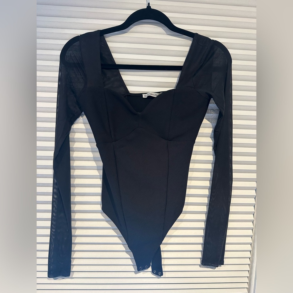 Black one piece top.